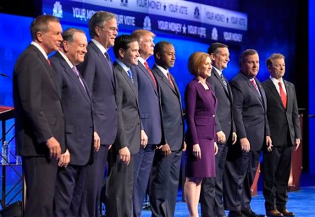 Republican presidential candidates, from left, John Kasich, Mike Huckabee, Jeb Bush, Marco Rubio, Donald Trump, Ben Carson, Carly Fiorina, Ted Cruz, Chris Christie, and Rand Paul take the stage during the CNBC Republican presidential debate at the University of Colorado, Wednesday, Oct. 28, 2015, in Boulder, Colo. (AP Photo/Mark J. Terrill)